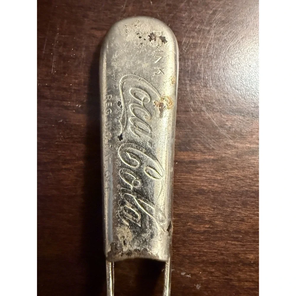 Vintage 1930's Coca Cola Metal Bottle Opener Consolidated Cork Corp Collectible